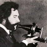 1876 bell speaking into telephone